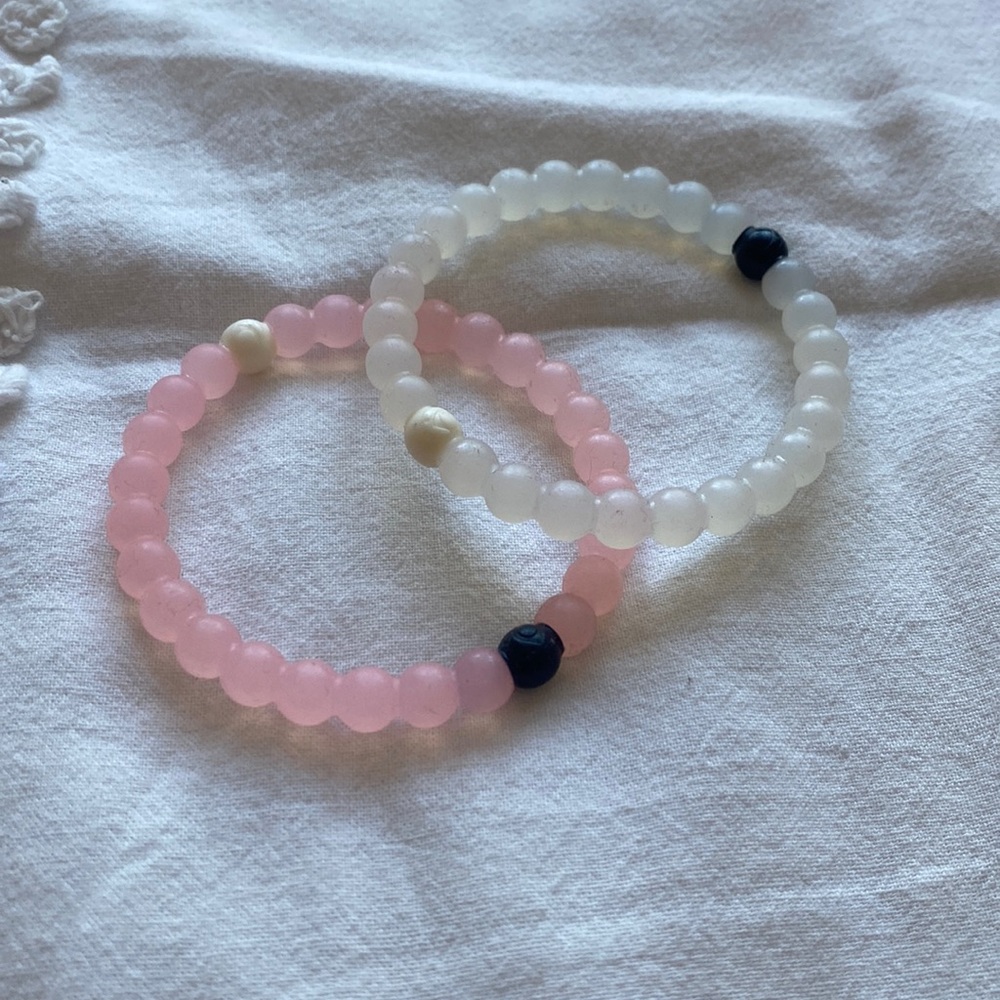 Lokai pink and clear bracelets